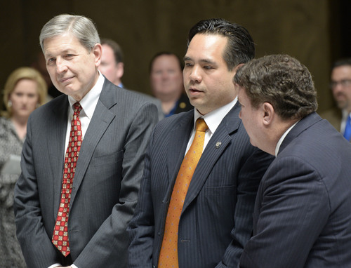 Al Hartmann  |  The Salt Lake Tribune
Gene Schaer who represented the state off Utah in Tenth Circuit Court, left, Utah Attorney General Sean Reyes and Rep. LaVar Christensen joined supporters of the defense of Amendment 3 at the Utah Capitol rotunda Friday April 11.