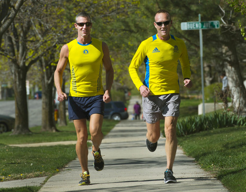 Steve Griffin  |  The Salt Lake Tribune


David Wiehe, left, and his spouse Stephen Clark are running in the Boston Marathon again this year after running it last year during the bombings. Here they run near their home in Salt Lake City April 11, 2014. Wiehe said he was within a couple of city blocks of the finish line when he heard the explosion and saw the smoke rising. He said he immediately stopped running because he knew something was seriously wrong.