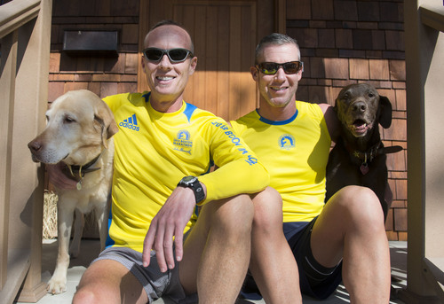 Steve Griffin  |  The Salt Lake Tribune


Stephen Clark, left, and his spouse David Wiehe are running in the Boston Marathon again this year after running it last year during the bombings. They are photographed here at their Salt Lake City home before a run April 11, 2014. Wiehe said he was within a couple of city blocks of the finish line when he heard the explosion and saw the smoke rising. He said he immediately stopped running because he knew something was seriously wrong.