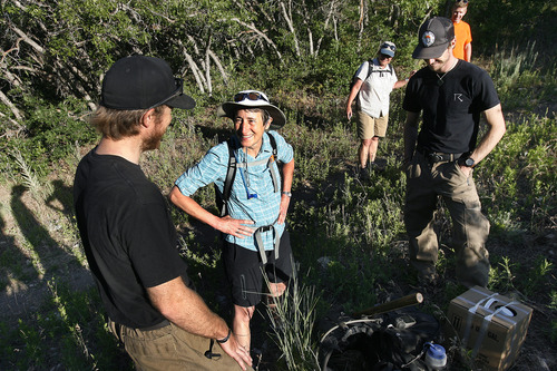 Scott Sommerdorf  |  The Salt Lake Tribune
Secretary of Interior Sally Jewell speaks with Hotshots crew members Ethan Hill, left, and Andrew Elkins, right, as she hikes to Barney's Peak in the Oquirrhs with BLM employees, Saturday, June 29, 2013.