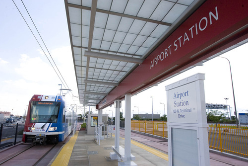 Paul Fraughton  |   Tribune file photo
A TRAX train pulls in to the Airport Station at Salt Lake City International Airport. The light rail train network, along with the FrontRunner commuter trains and higher density housing were some of the solutions Utah used to deal with rapid population growth. At the Top of Utah Transportation Expo on Thursday, planners said the state should once again consider such options to deal with population growth in the future.