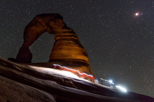 Trent Nelson  |  The Salt Lake Tribune
Onlookers of the total lunar eclipse at Delicate Arch in Arches National Park, Tuesday April 15, 2014.