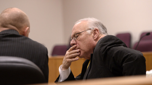 Al Hartmann  |  The Salt Lake Tribune
Utah County prosecuter Sam Pead, left confers with defense lawyer Dean Zabriskie during Meagan Grunwald's preliminary hearing in Judge Darold McDade's courtroom in Provo Wednesday April 16.   Zabriskie is defending Grunwald who is charged in connection with a fatal officer shooting in Utah County.