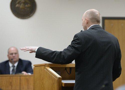 Al Hartmann  |  The Salt Lake Tribune
Utah County prosecuter Sam Pead, right,  questions Sgt. Scott Finch, Utah County criminal investigator during Meagan Grunwald's preliminary hearing in Judge Darold McDade's courtroom in Provo Wednesday April 16.   Grunwald is charged in connection with the fatal officer shooting in Utah County.