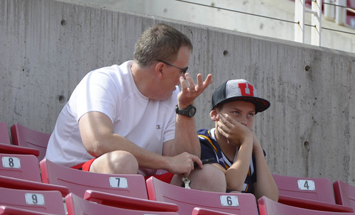 Leah Hogsten  |  The Salt Lake Tribune
A father and son watch he University of Utah football team practice Tuesday, April 15, 2014, at Rice-Eccles Stadium.