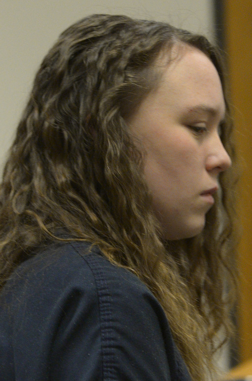 Rick Egan  |  The Salt Lake Tribune

Meagan Grunwald, a teen charged in connection with fatal officer shooting in Utah County, during a break in her preliminary hearing in Judge Darold McDade's courtroom in Provo Thursday April 17, 2014