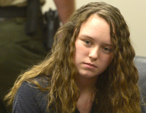 Rick Egan  |  The Salt Lake Tribune

Meagan Grunwald, a teen charged in connection with fatal officer shooting in Utah County, during her preliminary hearing in Judge Darold McDade's courtroom in Provo Thursday April 17, 2014