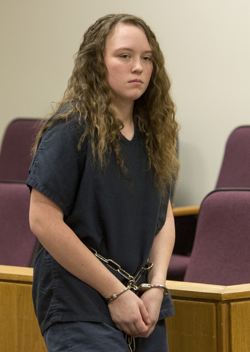Rick Egan  |  The Salt Lake Tribune

Meagan Grunwald, a teen charged in connection with fatal officer shooting in Utah County, enters the courtroom after a recess, in the preliminary hearing in Judge Darold McDade's courtroom in Provo Thursday April 17, 2014