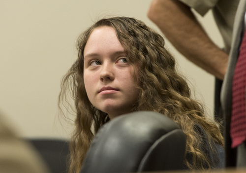 Rick Egan  |  The Salt Lake Tribune

Meagan Grunwald, a teen charged in connection with fatal officer shooting in Utah County, during her preliminary hearing in Judge Darold McDade's courtroom in Provo Thursday April 17, 2014