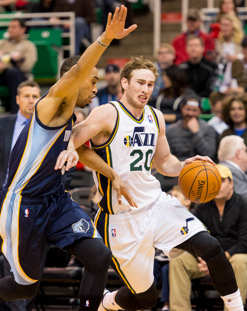 Trent Nelson  |  The Salt Lake Tribune
Utah Jazz guard Gordon Hayward (20) drives past Memphis Grizzlies guard Courtney Lee (5) as the Utah Jazz face the Memphis Grizzlies, NBA basketball at EnergySolutions Arena in Salt Lake City, Wednesday, March 26, 2014.