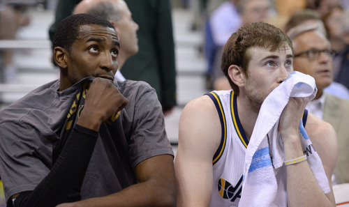 Steve Griffin  |  The Salt Lake Tribune


Utah Jazz forward Jeremy Evans (40) and Utah Jazz guard Gordon Hayward (20) can only watch from the bench as the Mavericks pull away during second half action at EnergySolutions Arena in Salt Lake City, Utah Wednesday, April 9, 2014.
