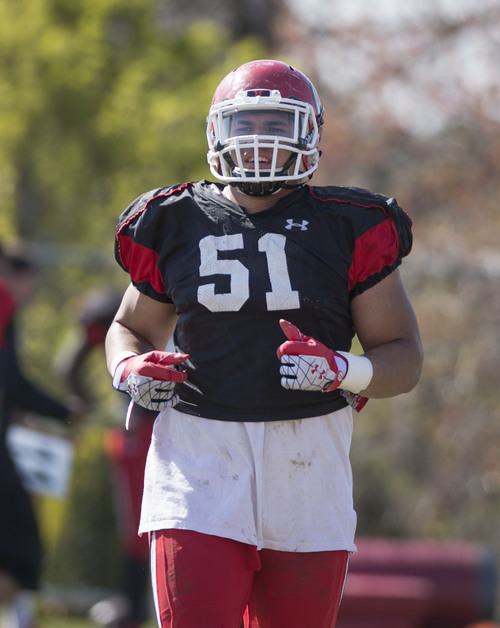 Steve Griffin  |  The Salt Lake Tribune


University of Utah defensive lineman, Jason Fanaika, 51, a transfer from Utah State, takes the field during spring football practice at the Spence Eccles Football Facility in Salt Lake City, Utah Tuesday, April 8, 2014.