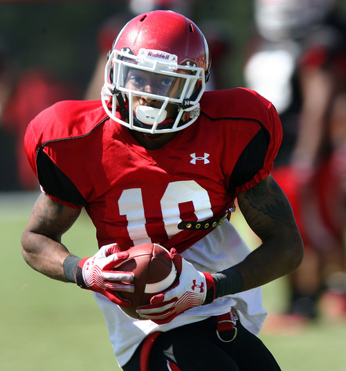 Steve Griffin | The Salt Lake Tribune

University of Utah wide receiver Delshawn McClellon, runs the ball after catching a pass during football practice on the University of Utah baseball field in Salt Lake City, Utah Friday August 9, 2013.