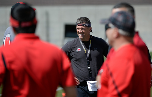 Franciso Kjolseth  |  The Salt Lake Tribune
University of Utah head football coach Kyle Whittingham gets his team ready for the season during Spring no pads practice at the Spence Eccles Football Facility on Thursday, April 17, 2014.