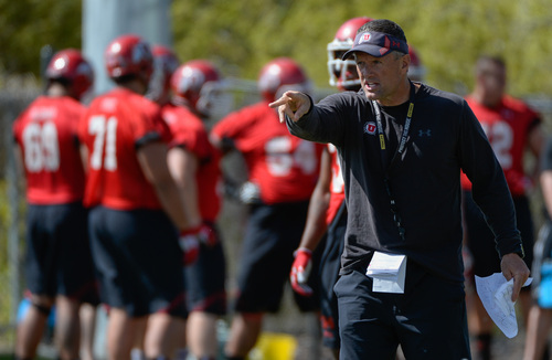 Franciso Kjolseth  |  The Salt Lake Tribune
University of Utah head football coach Kyle Whittingham gets his team ready for the season during Spring no pads practice at the Spence Eccles Football Facility on Thursday, April 17, 2014.