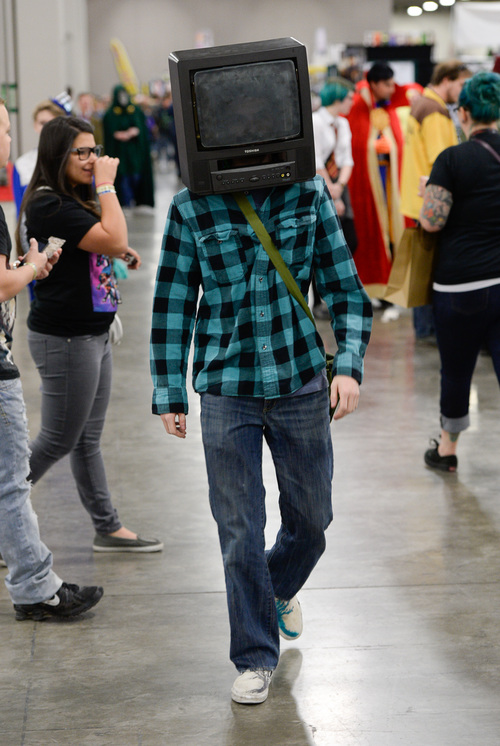 Franciso Kjolseth  |  The Salt Lake Tribune
George Millar struts his stuff with tunes playing in his head as he joins thousands of fiction fans from near and far gathered at the  Salt Palace Convention Center for day two of Salt Lake Comic Con's FanX.