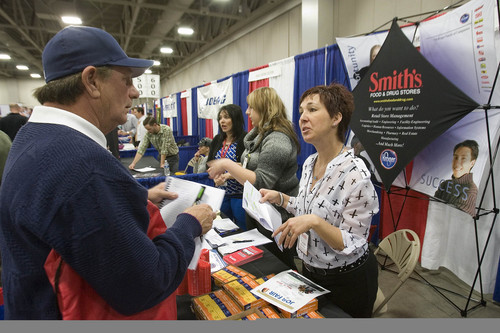 Paul Fraughton  |   Salt Lake Tribune
 Tonya Gonzales of Smith's Food and Drug Stores talks with David Dobbs about available jobs at different stores in the area. Hundreds of former and active military men and women met with potential employers  at the 2013  Hiring Our Heros Job Fair held at the Salt Palace Convention Center in conjunction with The Governor's Military and Family Summit.                                                     
 Wednesday, April 17, 2013