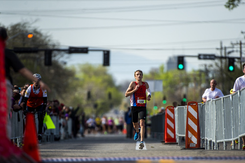 Chris Detrick  |  The Salt Lake Tribune
Fritz Van De Kamp, of Salt Lake City, runs to the finish line of the Salt Lake City marathon Saturday April 19, 2014. Van De Kamp won the marathon with a time of 2:28:18.