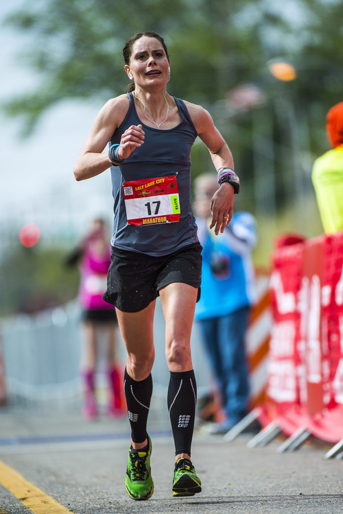 Chris Detrick  |  The Salt Lake Tribune
Melanie Burnham runs to the finish line of the Salt Lake City marathon Saturday April 19, 2014. Burnham won the women's marathon with a time of 3:02:46.