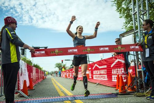 Chris Detrick  |  The Salt Lake Tribune
Melanie Burnham crosses the finish line of the Salt Lake City marathon Saturday April 19, 2014. Burnham won the women's marathon with a time of 3:02:46.