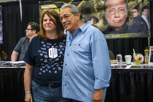 Chris Detrick  |  The Salt Lake Tribune
Edward James Olmos poses for a picture with Angela Wilkins, of West Bountiful, at Salt Lake Comic Con FanXperience at the Salt Palace Convention Center Saturday April 19, 2014.
