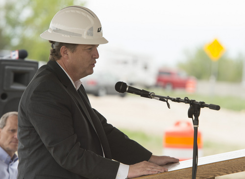 Rick Egan  |  The Salt Lake Tribune
Commissioner Jeff Holt speaks before the ceremonial dig in Bountiful, to begin the I-15 South Davis Project, to add express lanes from North Salt Lake to Farmington, and redo interchanges and bridges on Friday.