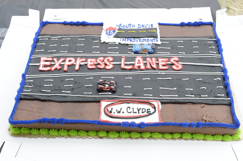 Rick Egan  |  The Salt Lake Tribune

A cake is decorated to celebrate the ceremonial dig in Bountiful, to begin the I-15 South Davis Project, to add express lanes from North Salt Lake to Farmington, and redo interchanges and bridges, Friday, April 18, 2014