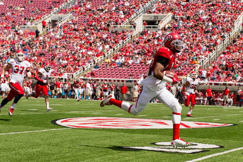 Trent Nelson  |  The Salt Lake Tribune
Utah's Brian Allen runs for a touchdown during the University of Utah's Red & White football game at Rice-Eccles Stadium in Salt Lake City, Saturday April 19, 2014.