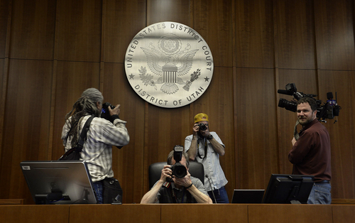 Scott Sommerdorf   |  The Salt Lake Tribune
Photographers capture views from the judge's seat inside one of the courtrooms during a media tour of the new Salt Lake City federal courthouse, Wednesday, April 9, 2014.