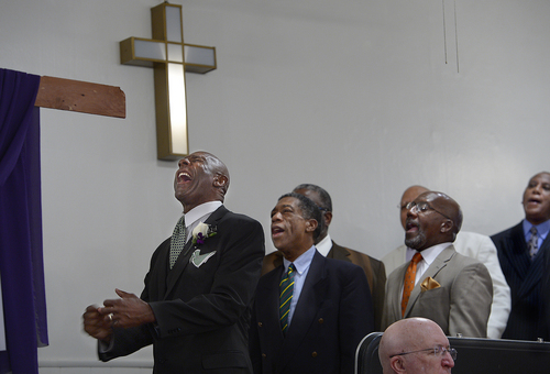 Scott Sommerdorf   |  The Salt Lake Tribune
The Calvary Missionary Baptist Choir with James Anderson at left sings at the  interdenominational sunrise service held at Trinity African Methodist Episcopal Church, Sunday, April 20, 2014. The service included members of United Methodist, Episcopal, and Calvary Baptist. The Rev. France Davis of Calvary Missionary Baptist spoke