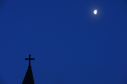Scott Sommerdorf   |  The Salt Lake Tribune
The steeple at Trinity African Methodist Episcopal Church and the moon on Sunday morning, April, 20, 2014. The small church was host to an interdenominational sunrise service. The Rev. France Davis of Calvary Missionary Baptist spoke at the service that included members of United Methodist, Episcopal, and Calvary Baptist.