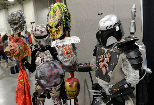 Franciso Kjolseth  |  The Salt Lake Tribune
"Mandalorian Bounty Hunters," Jana Grasseschi, left, and Jason rave over the Salt Lake's Comic Con's FanX after making the drive from Colorado for a second year in a row saying they won't bother with the one in Denver after attending the one here.
