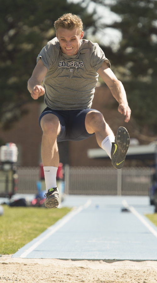 Rick Egan  |  The Salt Lake Tribune

BYU's Chase Dalton practices the long jump at Clarence Robinson Field in Provo, Monday, April 14, 2014.  Dalton has the best score in the Decathlon this season.