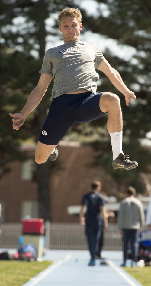 Rick Egan  |  The Salt Lake Tribune

BYU's Chase Dalton practices the long jump at Clarence Robinson Field in Provo, Monday, April 14, 2014.  Dalton has the best score in the Decathlon this season.