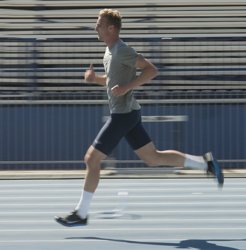 Rick Egan  |  The Salt Lake Tribune

BYU's Chase Dalton runs laps during practice at Clarence Robinson Field in Provo, Monday, April 14, 2014.  Dalton has the best score in the Decathlon this season.