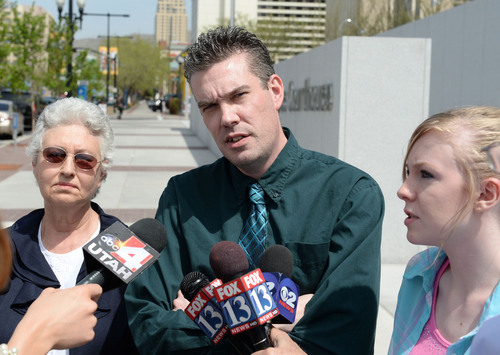 Steve Griffin  |  The Salt Lake Tribune


Perry Cardwell and Sara Jacobson talk to reporters after witnessing a shooting where a U.S. Marshal shot a defendant during the first day of trial for an alleged Tongan Crip gang member in Salt Lake Cityís new federal courthouse Monday April 21, 2014. Mark Dressen, FBI assistant special agent in charge, said the defendant charged the witness stand with a pen or pencil, prompting a U.S. Marshal to shoot the man multiple times in the chest. Sandra Keyser, left, was set to testify in the trial and was outside the courtroom at the time of the shooting.