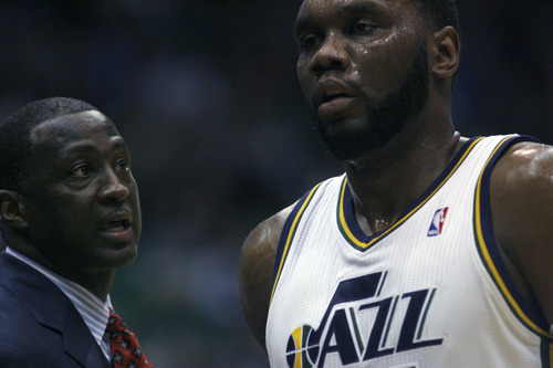 Chris Detrick  |  The Salt Lake Tribune
Utah Jazz head coach Tyrone Corbin talks with Utah Jazz center Al Jefferson (25) during the first half of the game at EnergySolutions Arena Tuesday February 19, 2013. The Jazz are winning the game 58-53.