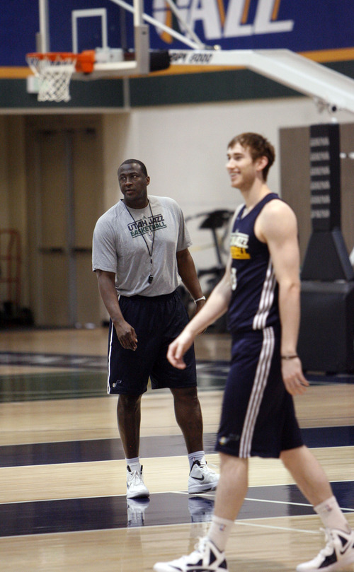 Francisco Kjolseth  |  The Salt Lake Tribune
Utah Jazz coach Tyrone Corbin works to get his team ready, including Gordon Hayward, right, as they prepare for round two of the playoffs against San Antonio at the Zions Bank Basketball Center on Tuesday, May 1, 2012. Much of their work hinders on their ability to defend Tony Parker of the Spurs.