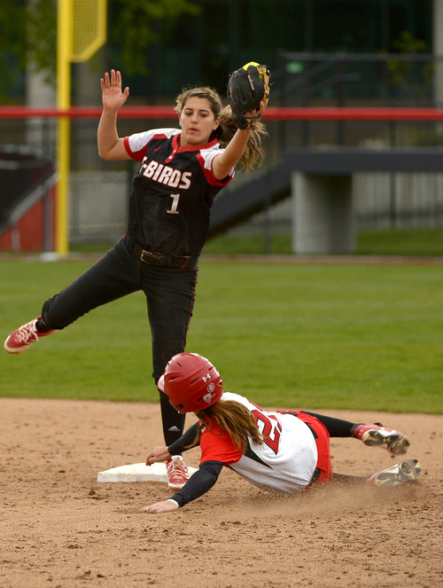 Leah Hogsten  |  The Salt Lake Tribune
Utah's Shelbi Everett slides safely into second after SUU's Cora Cordova can't make the tag. University of Utah women's softball team defeated Southern Utah University 12-4 during their first game of a doubleheader, Tuesday, April 22, 2014.