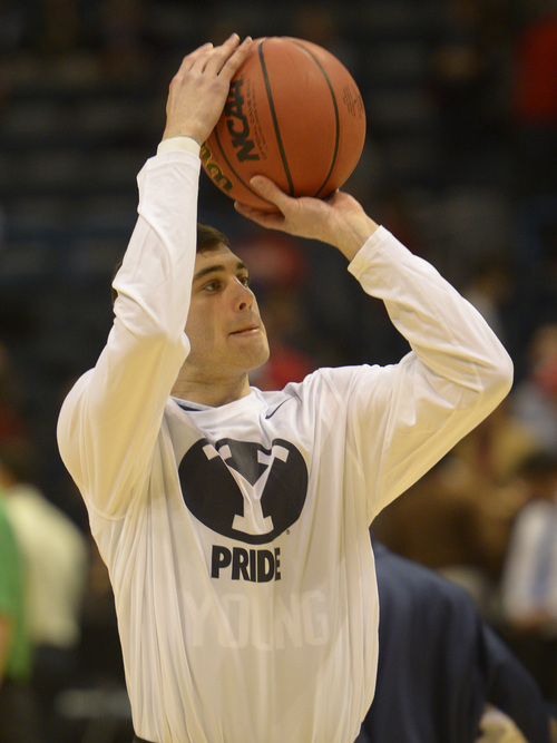 Rick Egan  | The Salt Lake Tribune 

Brigham Young Cougars guard Matt Carlino (2) warms up before playing the Oregon Ducks in the second round NCAA Championships,  in Milwaukee, 
Thursday, March 20, 2014.
