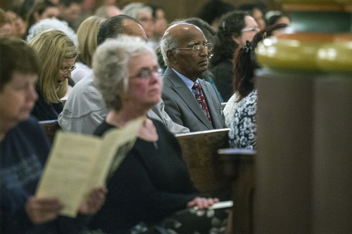 Chris Detrick  |  The Salt Lake Tribune
Saman Lall listens during the Mass of the Lord's Supper at the Cathedral of the Madeleine on Thursday, April 17, 2014.