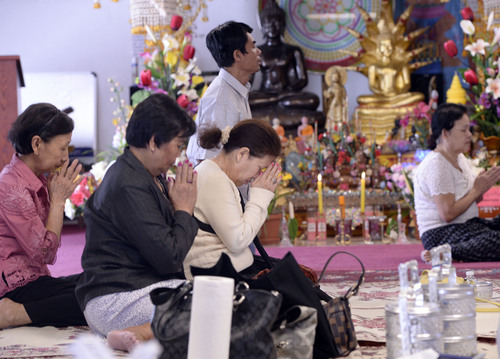 Al Hartmann  |  The Salt Lake Tribune
Members of the Cambodian community pray at their West Valley City temple. A large multipurpose building, called Sala Chhan, is being constructed on the property.