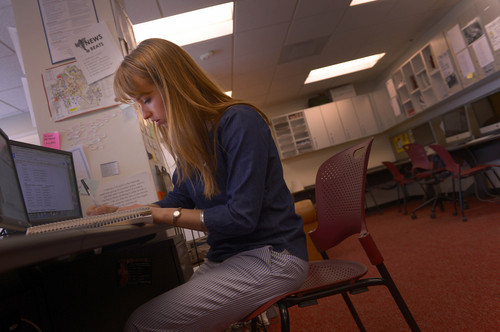 Leah Hogsten  |  The Salt Lake Tribune
University of Utah student Anna Drysdale edits copy at The Utah Chronicle, Wednesday, April 16, 2014. Drysdale is learning to balance the responsibilities of life with a difficult academic and work schedule. The fourth-year English, French and German major is a full-time student and part-time worker who is struggling to balance the needs of working at the student newspaper with a heavy class load, all the while trying to earn scholarships so she can avoid taking out student loans.