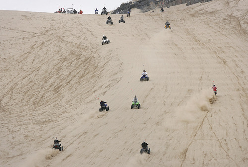 Scott Sommerdorf  |  Salt Lake Tribune
LITTLE SAHARA
A variety of vehicles power up the "Sand Mountain" incline at Little Sahara National Recreation Area, Saturday 4/3/10. Four- and two-wheel enthusiasts, dune buggies and more kick off the spring season with motorized recreation and camping at Little Sahara sand dunes., Saturday 4/3/10.