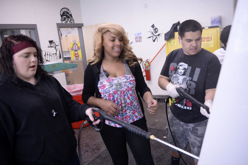 Al Hartmann  |  The Salt Lake Tribune
An increasing number of high schools in Utah are adding ninth-grade.  The new Granger High School added ninth grade this school year bringing its enrollment up to about 2,900.  Ninth-graders Madison Davidson, left, Alaniyan Tillman and Angel Sosa clean up their silk screen project in graphics class.  Most ninth graders say that they like the extra class choices offered in high school.
