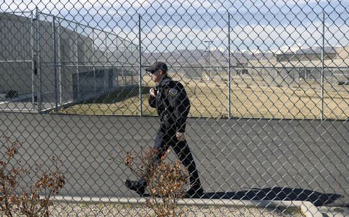 Al Hartmann  |  The Salt Lake Tribune 
Utah Deapertment of Corrections officer patrol the grounds at the Utah State Prison in Draper.