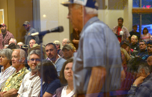 Leah Hogsten  |  The Salt Lake Tribune
Longtime Moab resident Ray Tibbetts showed his support for drilling and oil exploration in the Book Cliffs.  The Grand County Council Public Lands Working Committee got an earful from Grand County residents who voiced their concerns  for long term designations of public lands within the county, Wednesday, April 23, 2014.  Three alternative plans were created for consideration as part of U. S. Congressman Rob Bishop's public lands bill initiative.