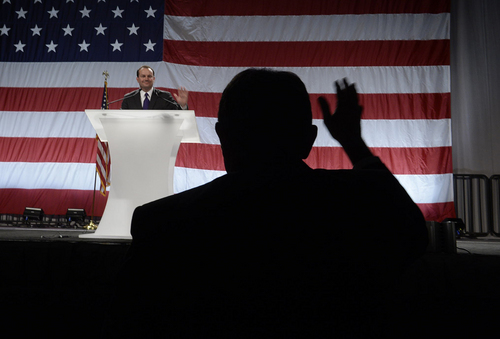 Scott Sommerdorf   |  The Salt Lake Tribune
Utah Governor Gary Herbert, foreground, waves at Senator Mike Lee as he arrived to speak at the Western Republican Leadership Conference. They held a rally at the South Towne Convention Center, Friday, April 25, 2014.