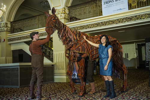 Chris Detrick  |  The Salt Lake Tribune
Maria Elena Ramirez talks about Joey, the horse puppet from the touring show of "War Horse," at the Capitol Theatre Wednesday April 23, 2014. Joey's puppeteers are James Duncan, head, Brian Burns, heart, and Aaron Haskeii, hind. The puppet weighs 120 pounds, with a frame of mostly cane that was soaked, bent and stained; it was made by a team of 14 people. An aluminum frame along the spine, lined partly with leather, allows the horse to be ridden.