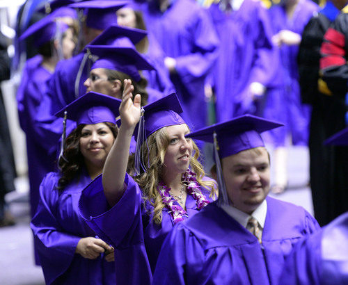 Al Hartmann  |  The Salt Lake Tribune
Weber State University graduates march in procession into the Dee Events Center for the 2014 commencement excercises Friday April 25.